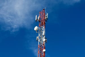 telecom company antenna on a blue sky in Canada