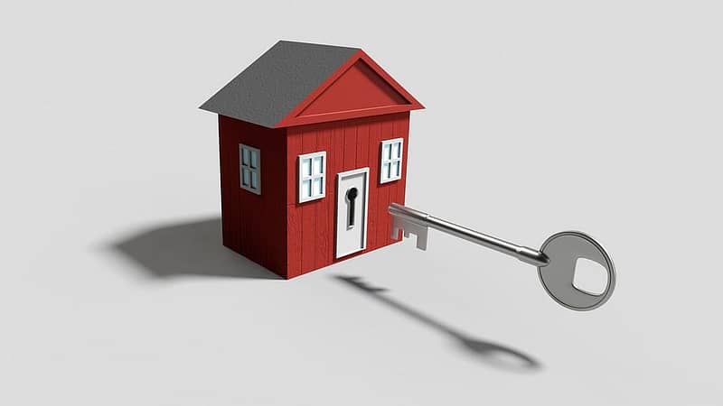 keys entering a mortgaged house