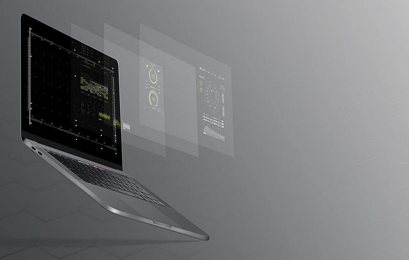 a laptop delisting stocks on a gray background