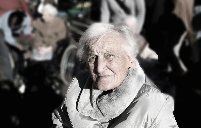 elderly survivor woman on a blurred background