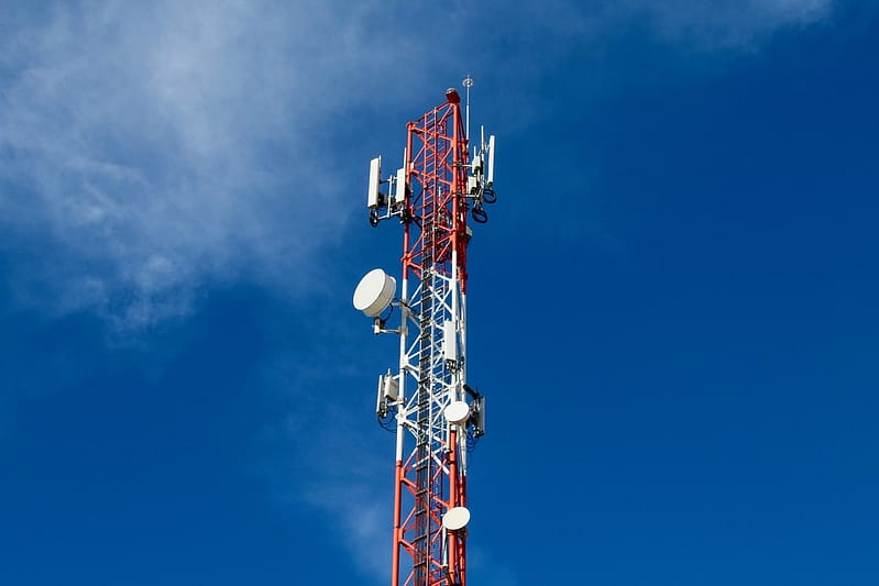 telecom company antenna on a blue sky in Canada