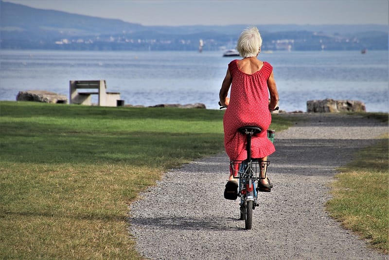 a senior person on a bike enjoying retirement in Canada
