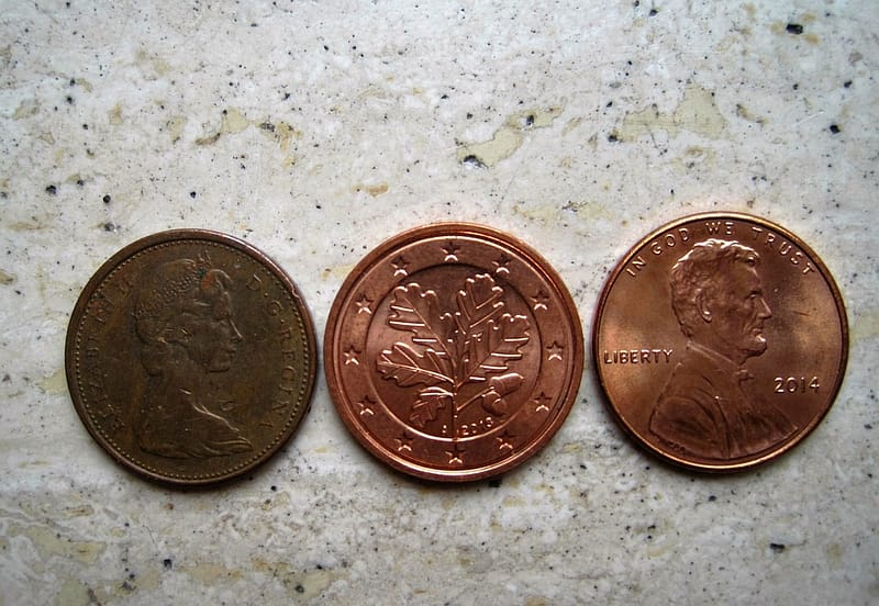coins at different stages of life, representing new and old investments