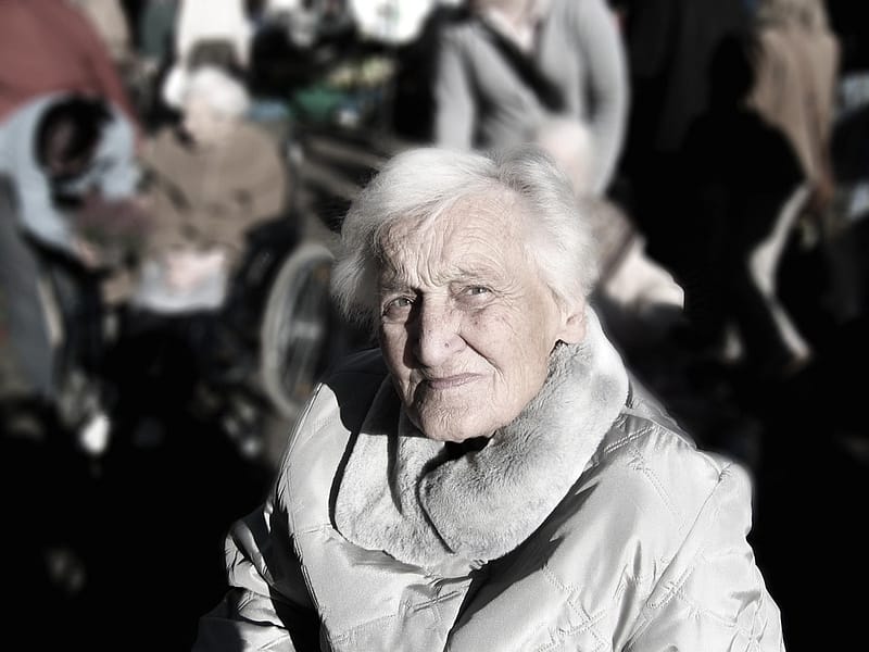 elderly survivor woman on a blurred background
